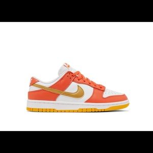 SOLD Nike Dunk Lows “University Gold” colorway